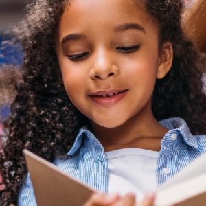 Young girl reading a book