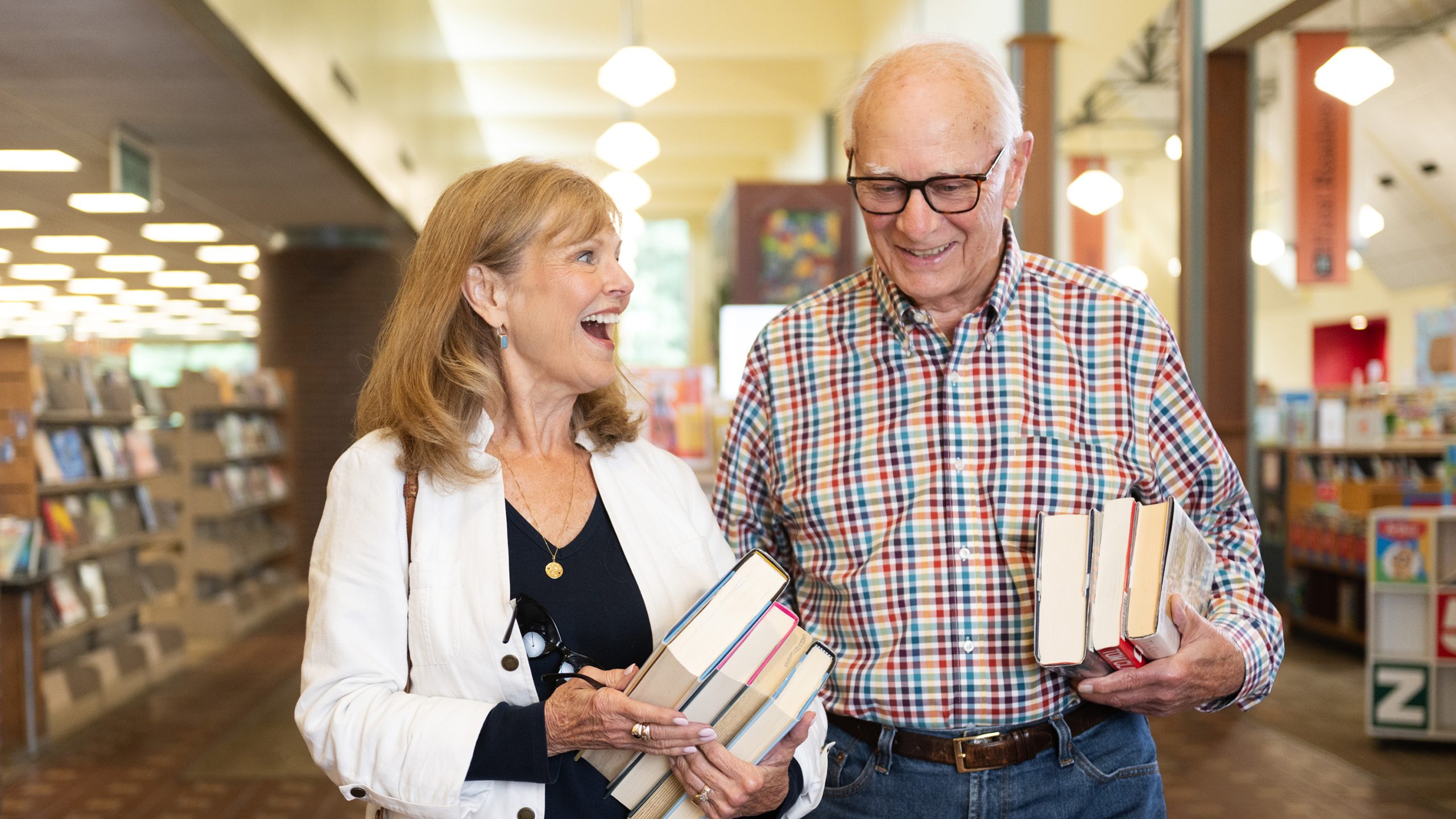 Senior couple in library