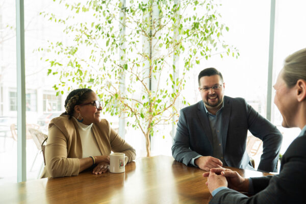 Adults meeting at library